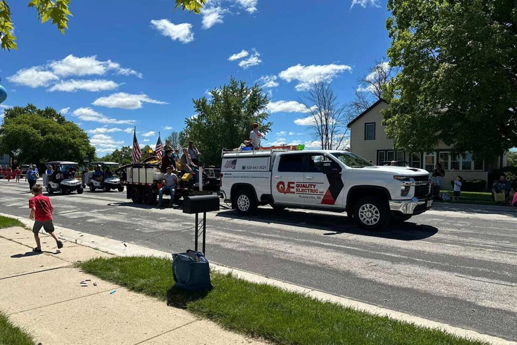 Quality Electric truck in a parade in Reedsville, WI.